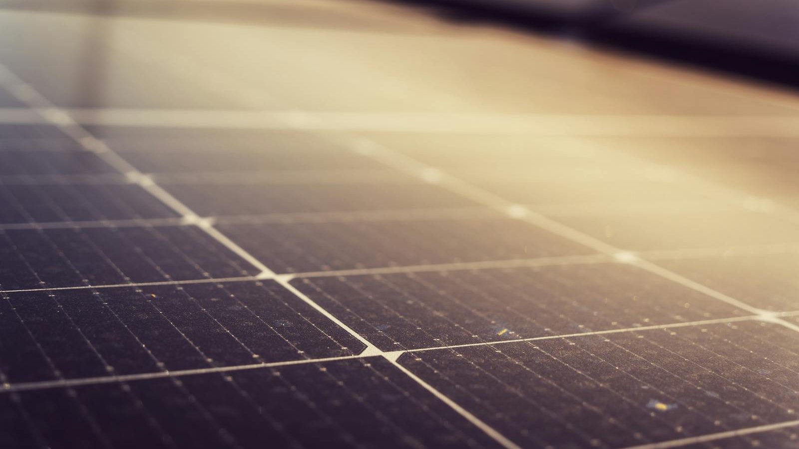 Checklist clipboard next to a solar panel