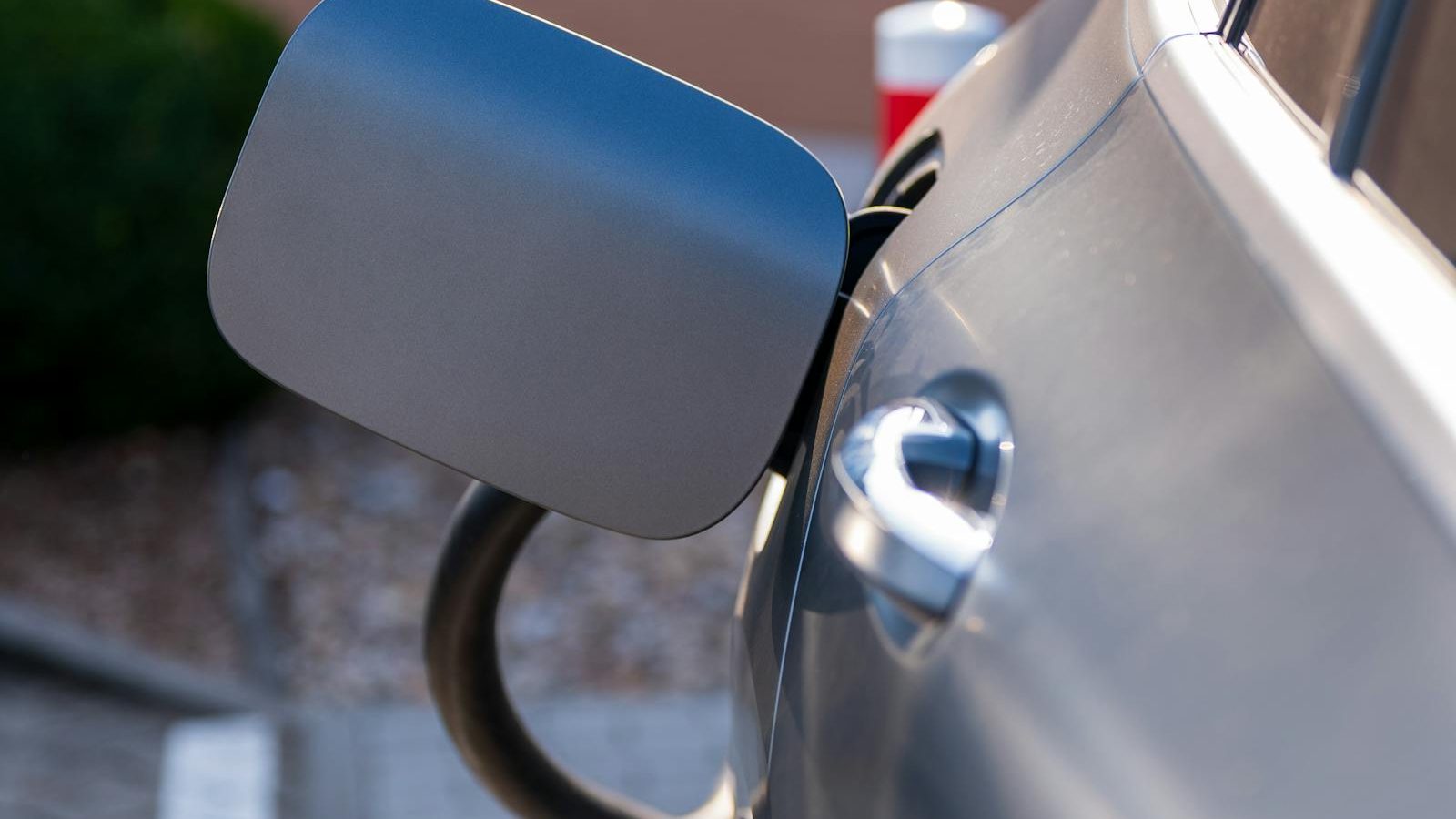 EV owner checking their dashboard display