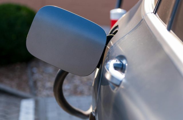 EV owner checking their dashboard display