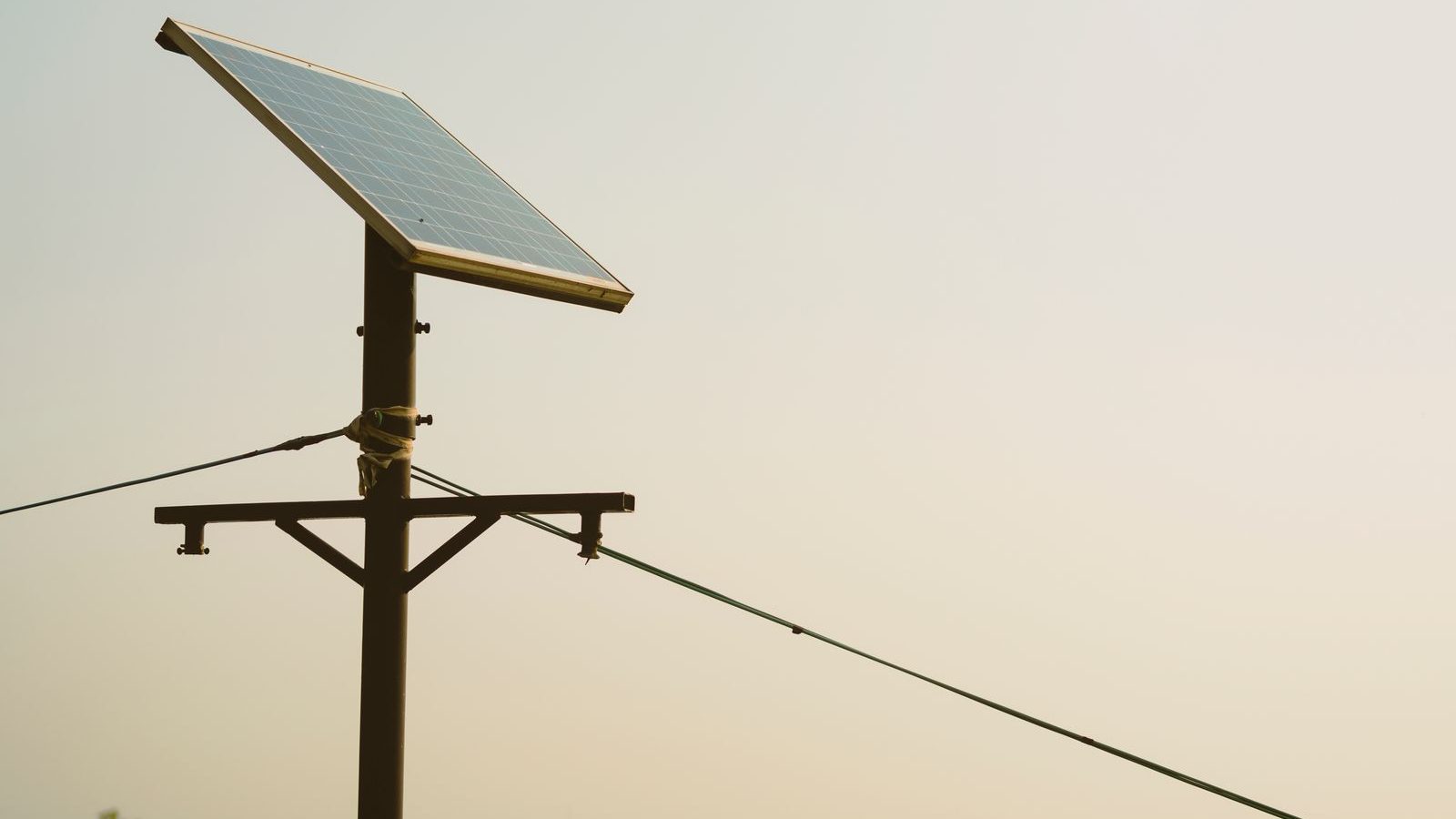 Snow-covered solar panels in winter